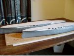 Both hulls are now GRP coated and with a coat of primer, prior to being rubbed down.
